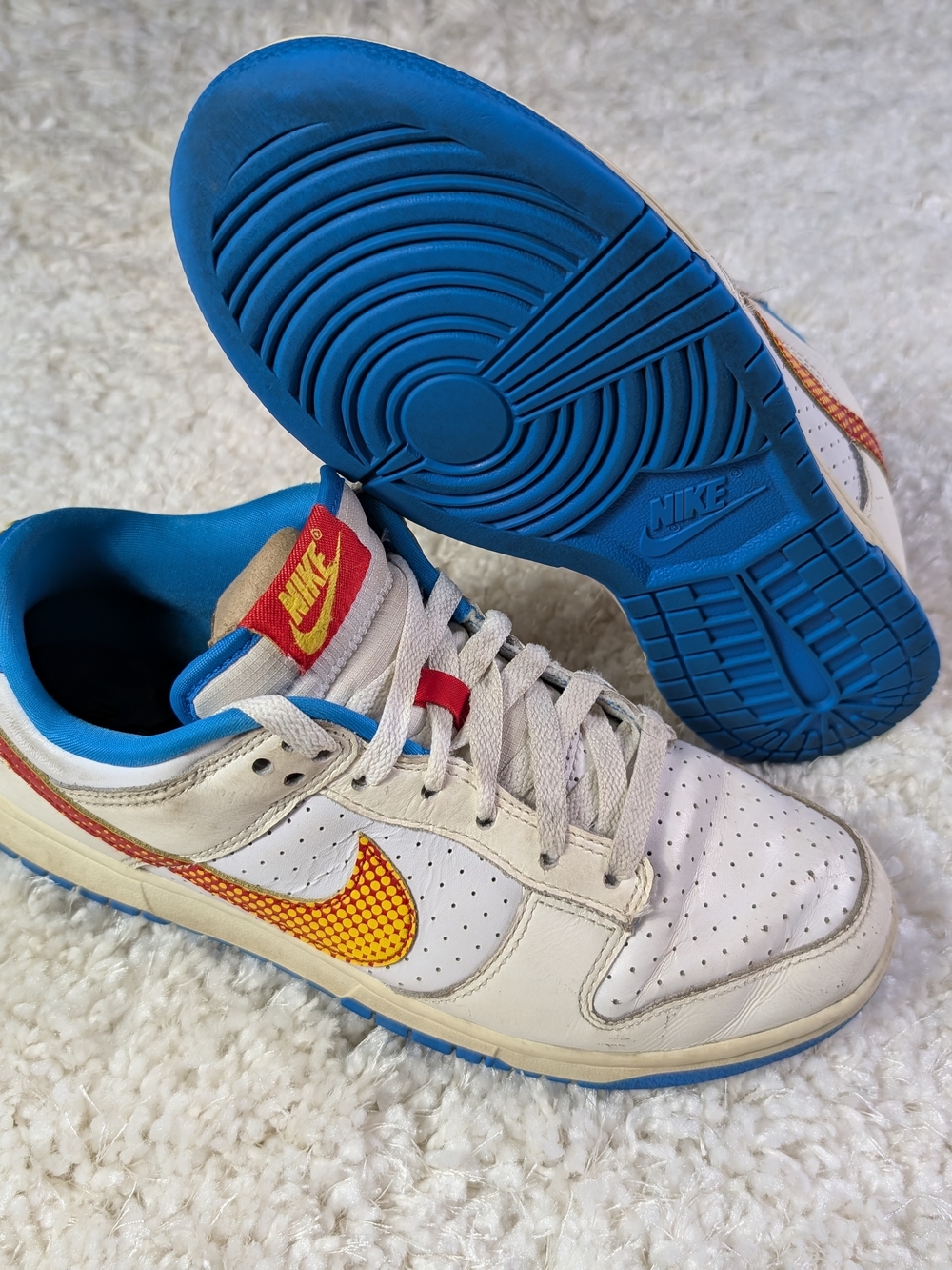 Nike Kids' White & Blue Low-Top Sneakers with Yellow Swoosh